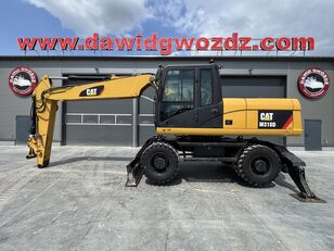 pelle sur pneus Caterpillar M318D
