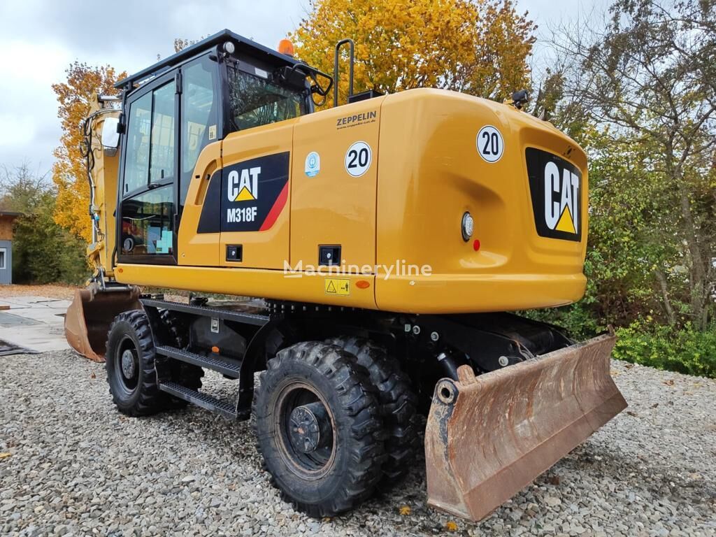 Caterpillar M318F wheel excavator