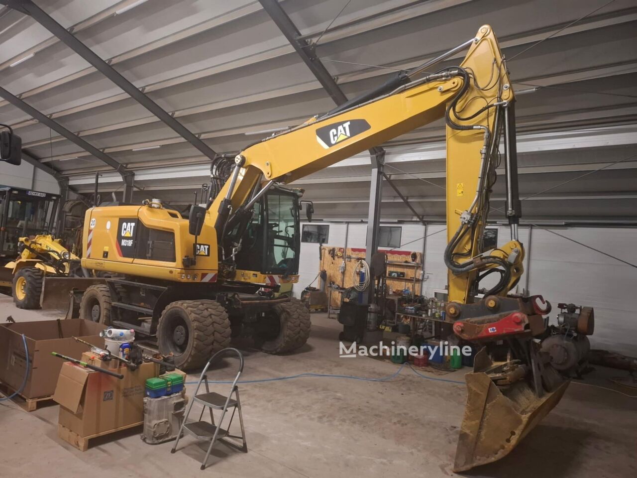 Caterpillar M318F excavadora de ruedas - Machineryline