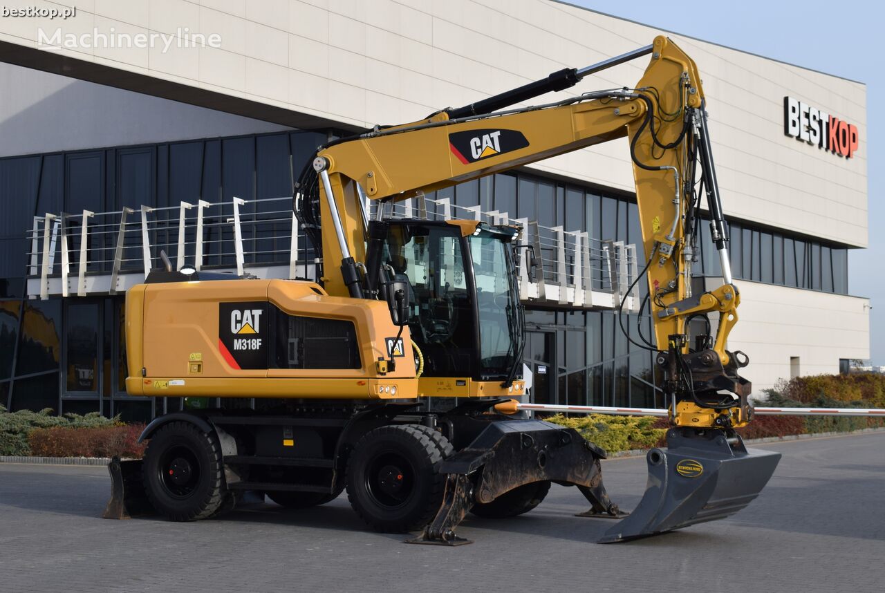 колесный экскаватор Caterpillar M318F CAT