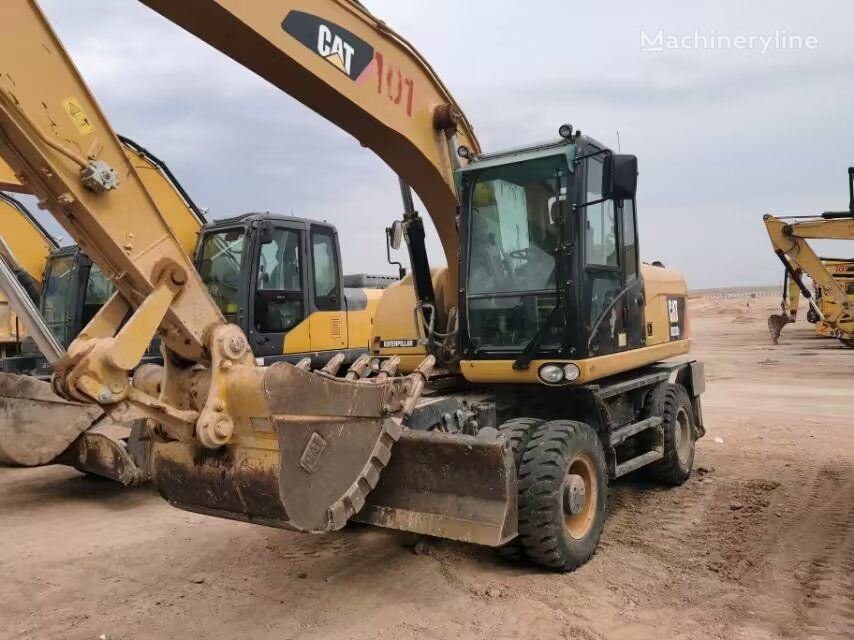 Caterpillar M320D2 excavadora de ruedas