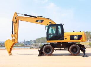 Caterpillar M320D2 excavadora de ruedas