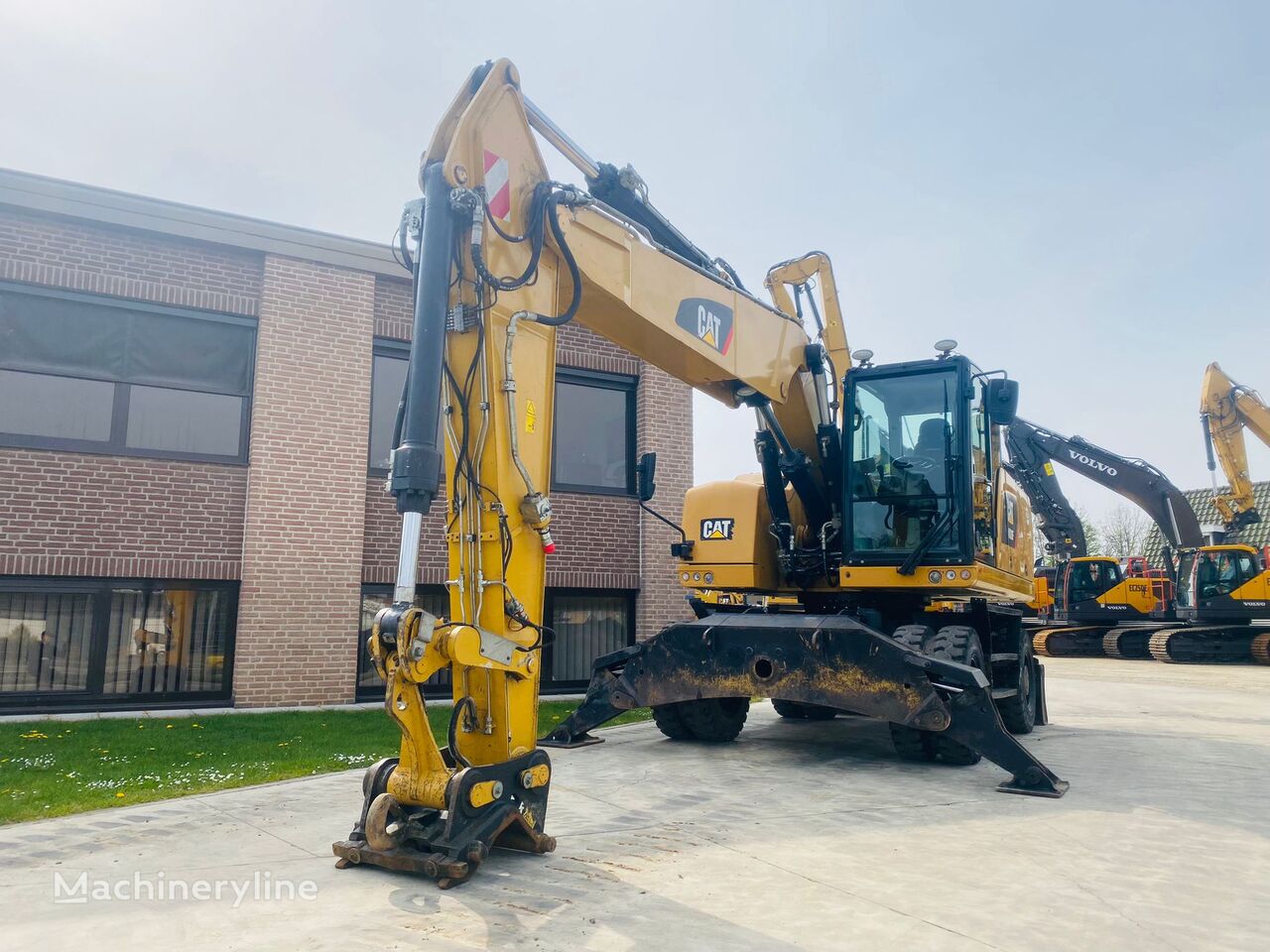 Caterpillar M320F excavadora de ruedas