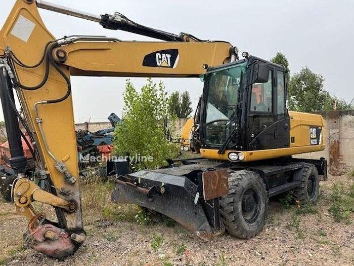 колесный экскаватор Caterpillar M322D