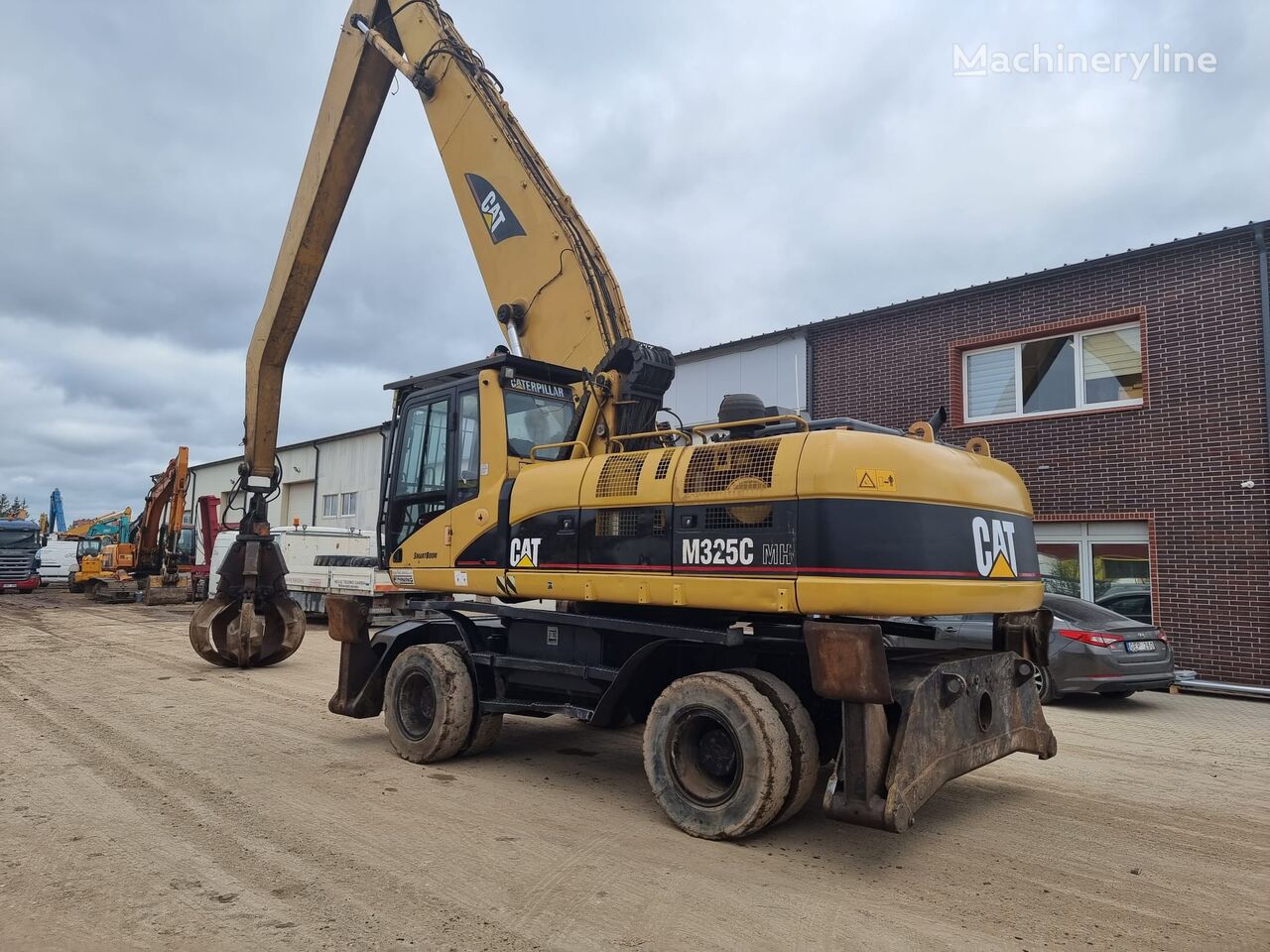 Caterpillar M325C LMH wheel excavator