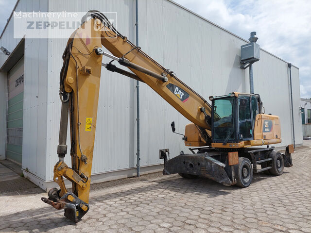 колесный экскаватор Caterpillar MH3024-06C