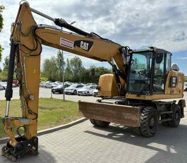 колесен багер Caterpillar koparka kołowa M 318F