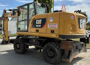 колесен багер Caterpillar koparka kołowa M 318F