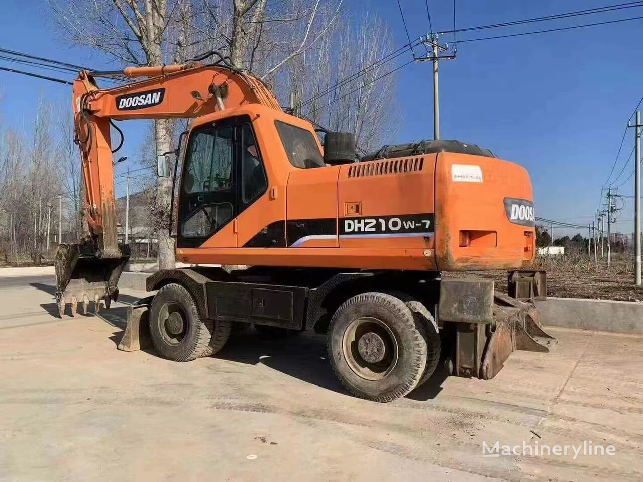 Doosan DH210W-7 riteņu ekskavators