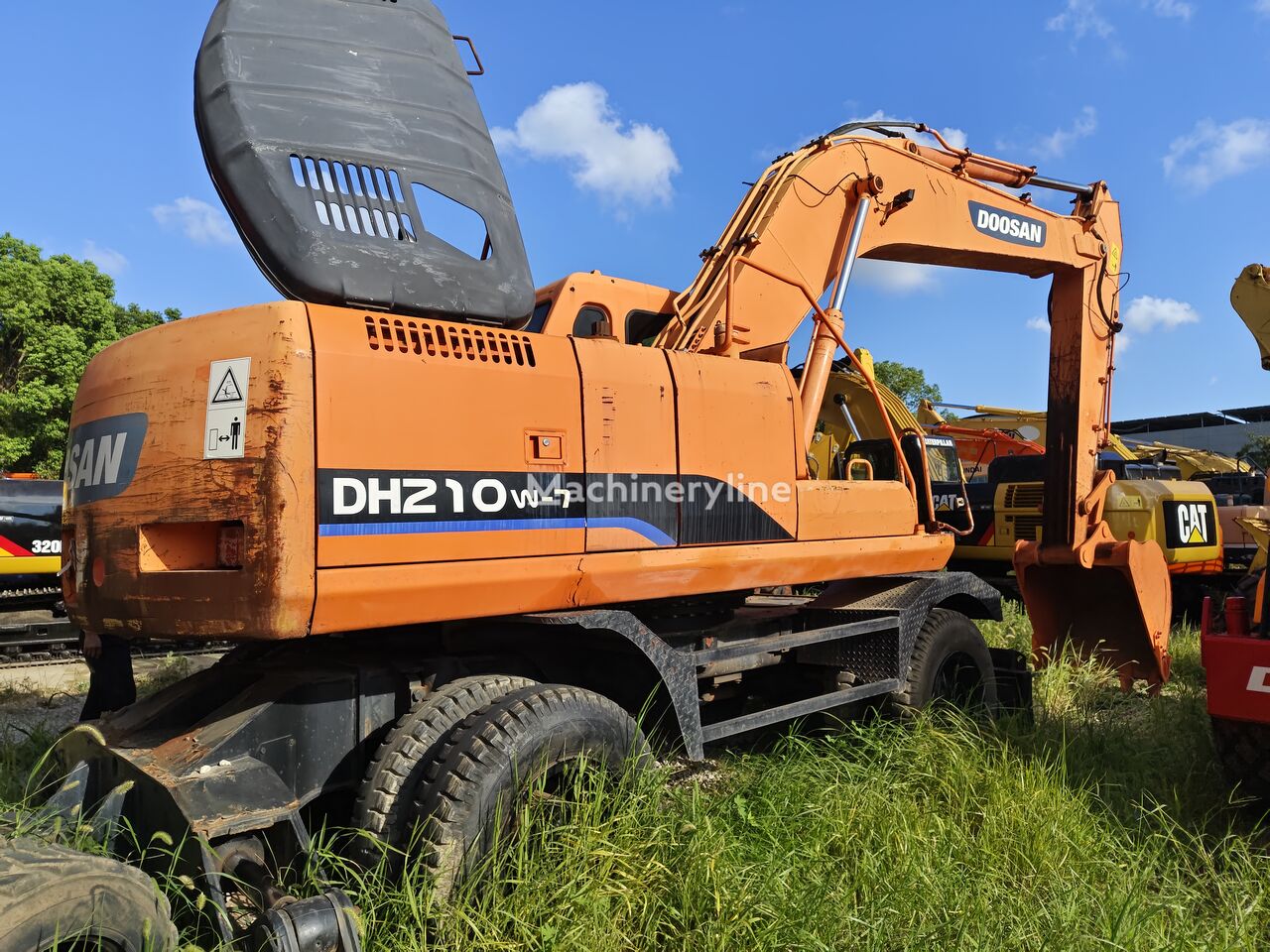 Pelle sur pneus Doosan DH210W-7 - Machineryline