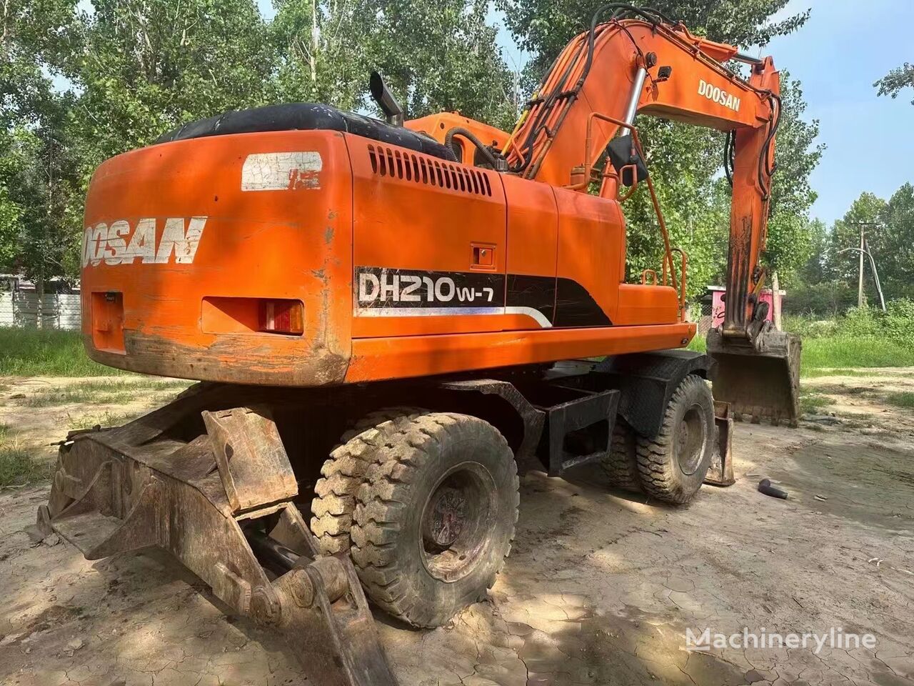 pelle sur pneus Doosan DH210W-7 Original Paint