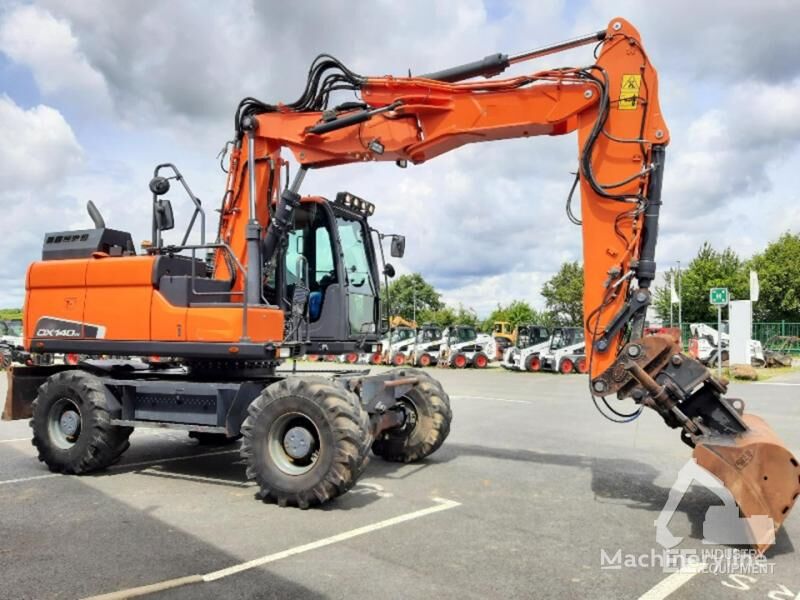 حفارة ذات العجلات Doosan DX 140 W-5