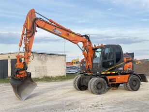 pelle sur pneus Doosan DX 160 W , ROTO + GRAPPLE
