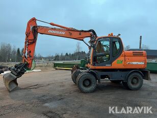 pelle sur pneus Doosan DX140W