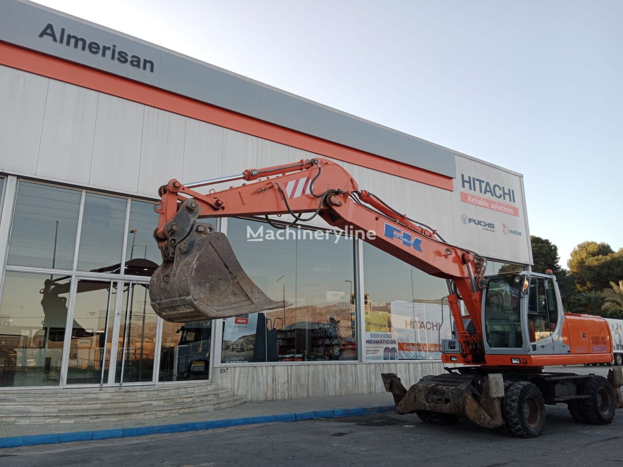 escavatore gommato FIAT KOBELCO EX-215-WN