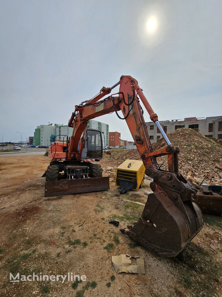 Fiat-Hitachi EX135 excavadora de ruedas