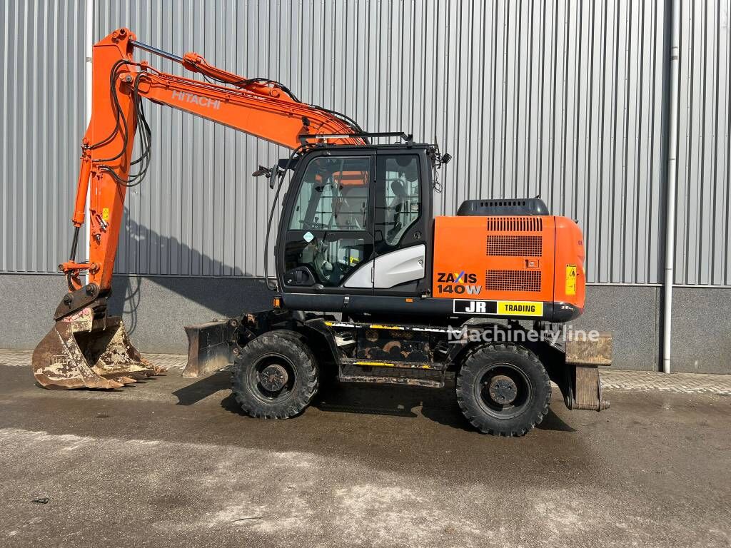 pelle sur pneus Hitachi ZX 140 W-5