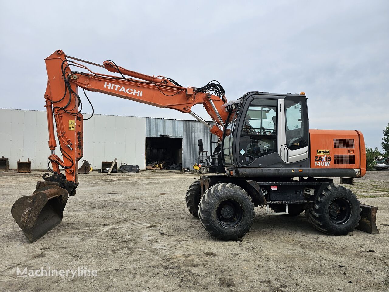 pelle sur pneus Hitachi ZX140W