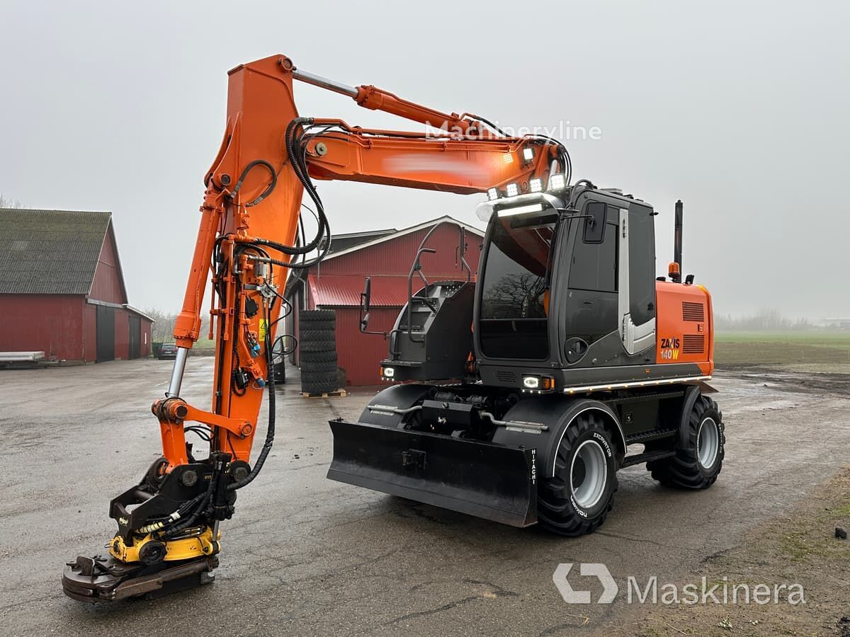 pelle sur pneus Hitachi ZX140W-3