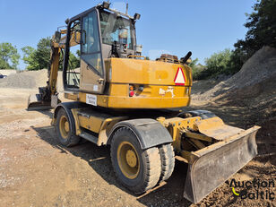 pelle sur pneus Hydrema M 1400