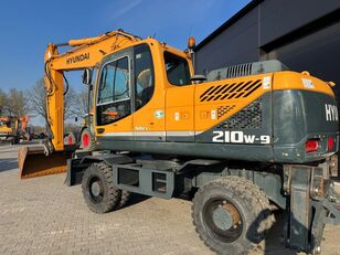 Hyundai 210-W9 LOW HOURS! 3200 HR BLADE AND STAMPS !! excavadora de ruedas
