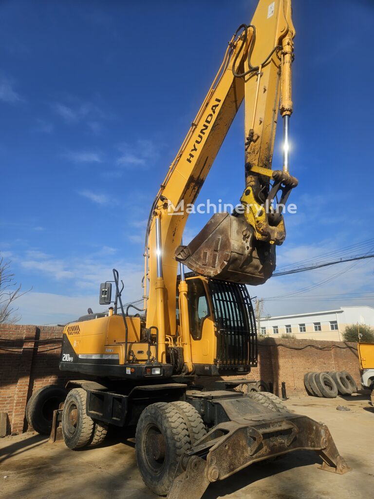 Hyundai 210w-9 gumikerekes kotró - Machineryline