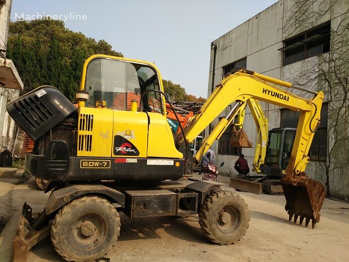 휠 굴착기 Hyundai 60W-7 150W 210W-9