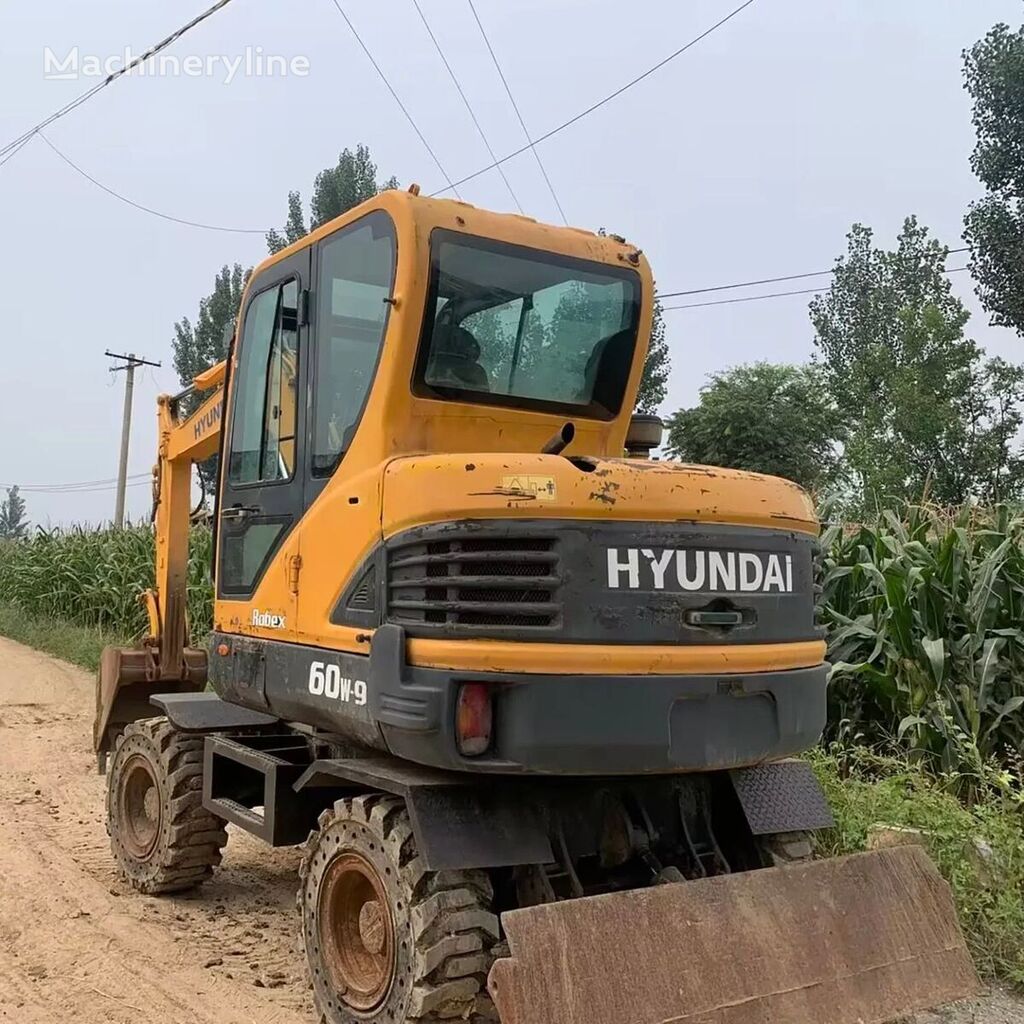 Hyundai 60w-9 riteņu ekskavators