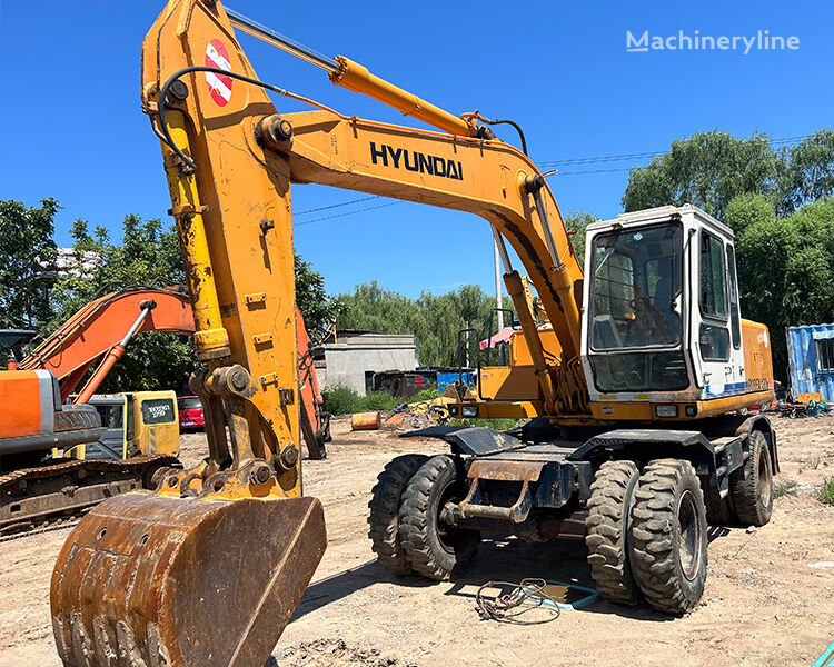 Hyundai X130W gravemaskine på hjul