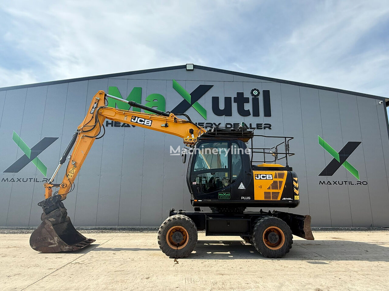 JCB JS 145 Excavator pe Roti excavadora de ruedas - Machineryline