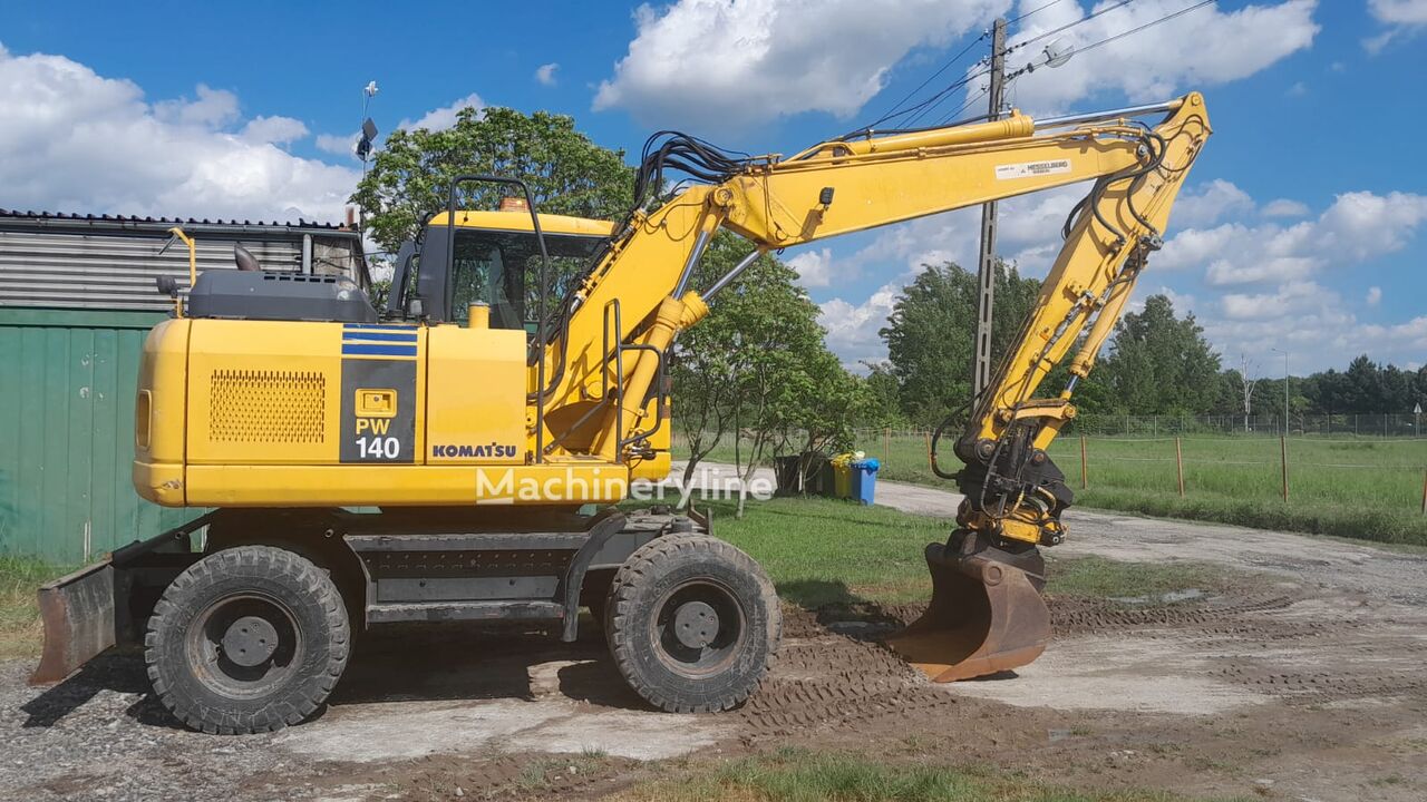 Pelle sur pneus Komatsu PW 140-7 à vendre | Machineryline FR Pelle sur pneus Komatsu PW 140-7 - Machineryline