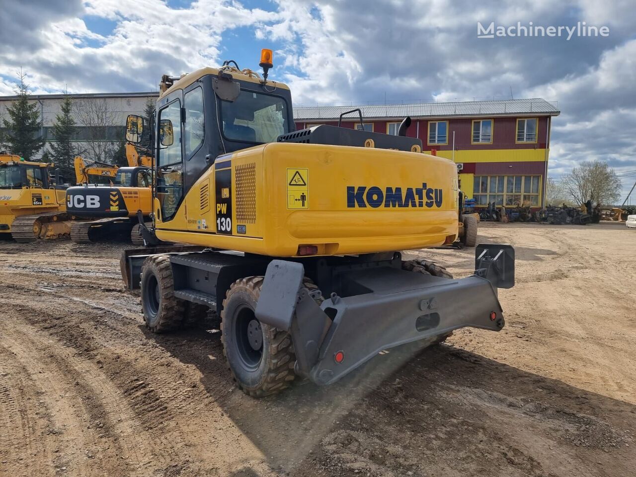 Komatsu PW130-7K gravemaskine på hjul