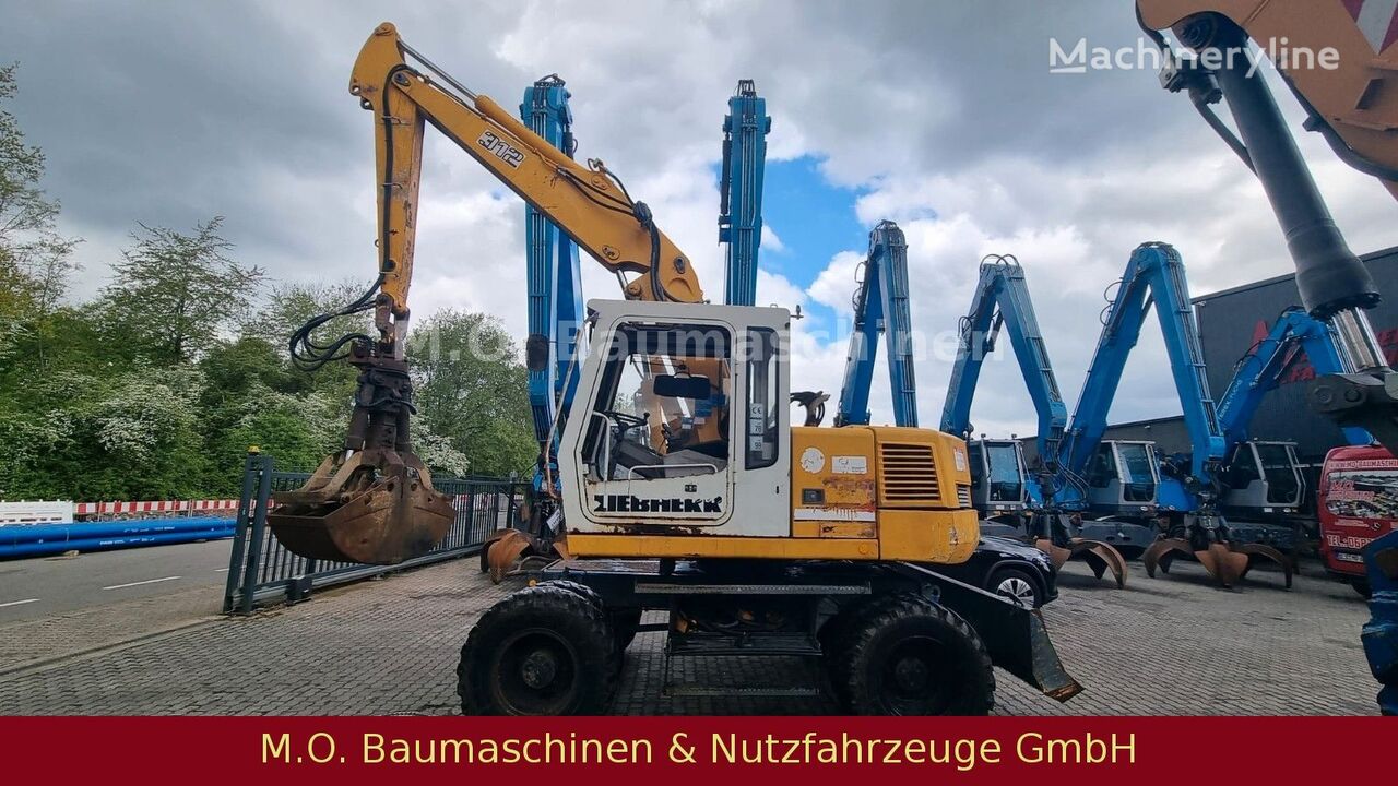 pelle sur pneus Liebherr A 312 / VSA / Schalengreifer /