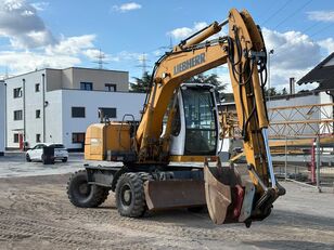 pelle sur pneus Liebherr A 314 Litronic