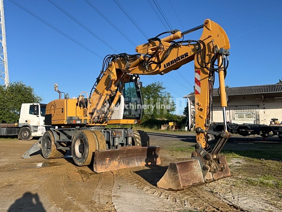 حفارة ذات العجلات Liebherr A 314 Litronic with VA offset boom