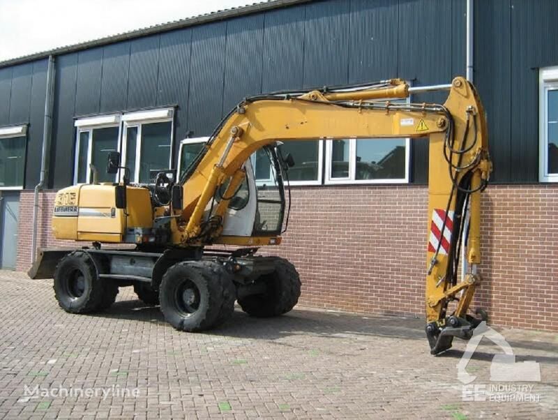 pelle sur pneus Liebherr A 316 LITRONIC