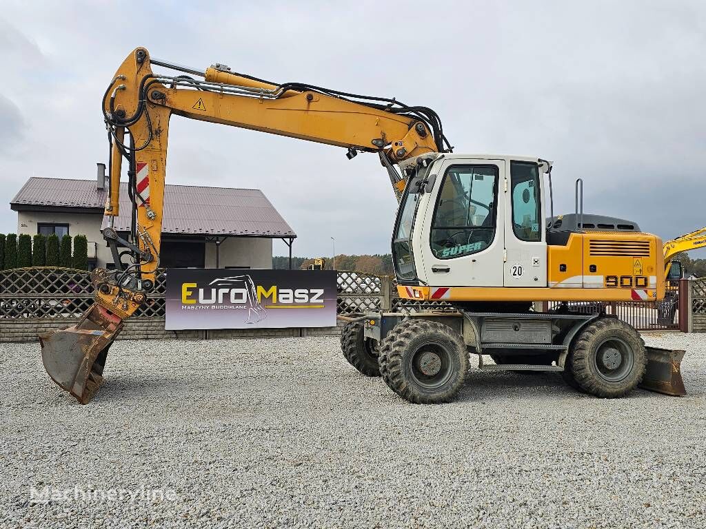 pelle sur pneus Liebherr A 900 C Litronic