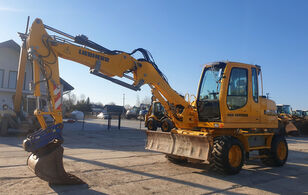 excavator pe roţi Liebherr A311