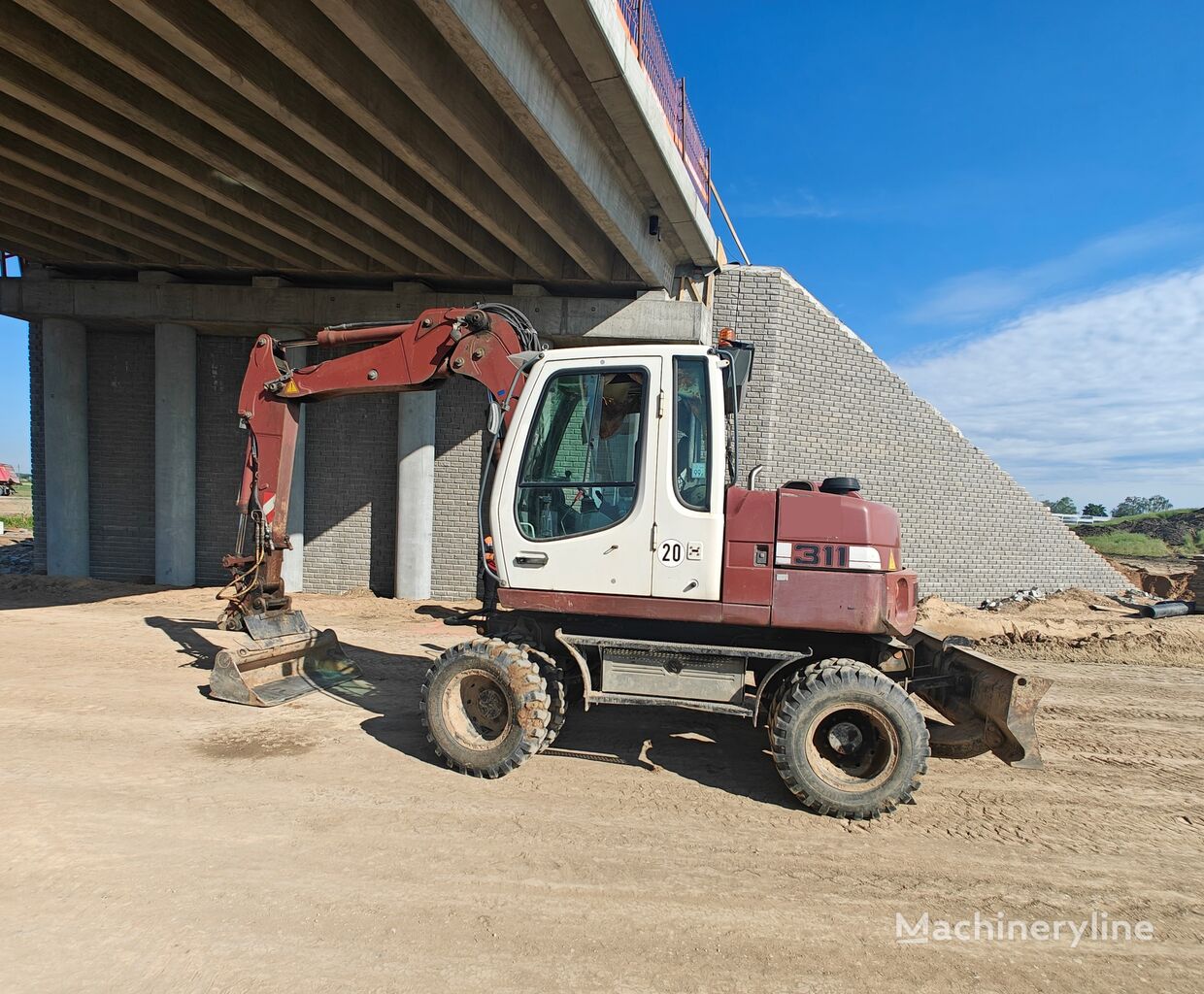 بیل مکانیکی چرخ لاستیکی Liebherr A311