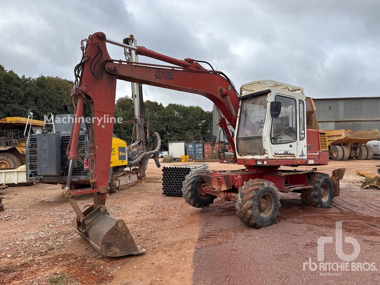 Liebherr A312 Pelle Sur Pneus wheel excavator - Machineryline