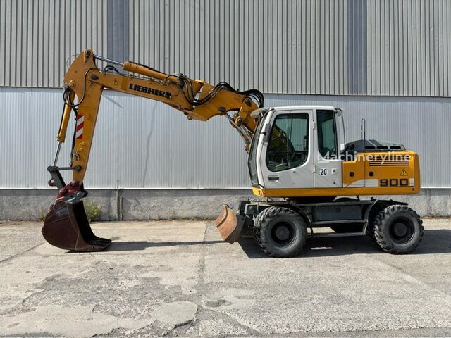 Pelle sur pneus Liebherr A900C - Machineryline