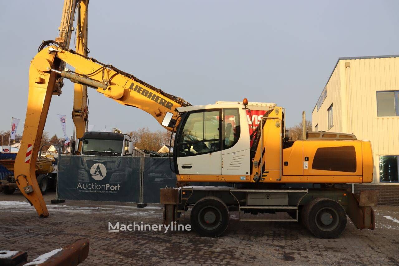 Pelle sur pneus Liebherr LH 30 M Litronic - Machineryline