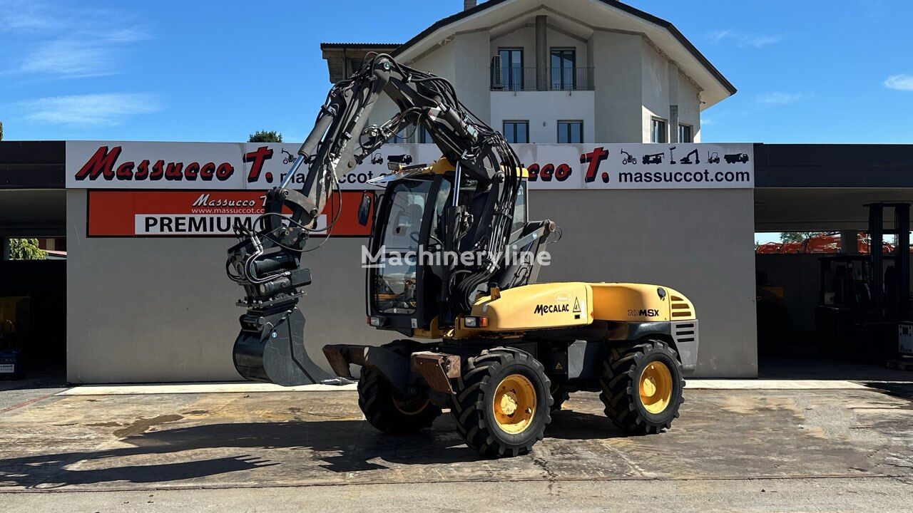 Mecalac 10MSX 4X4 excavadora de ruedas