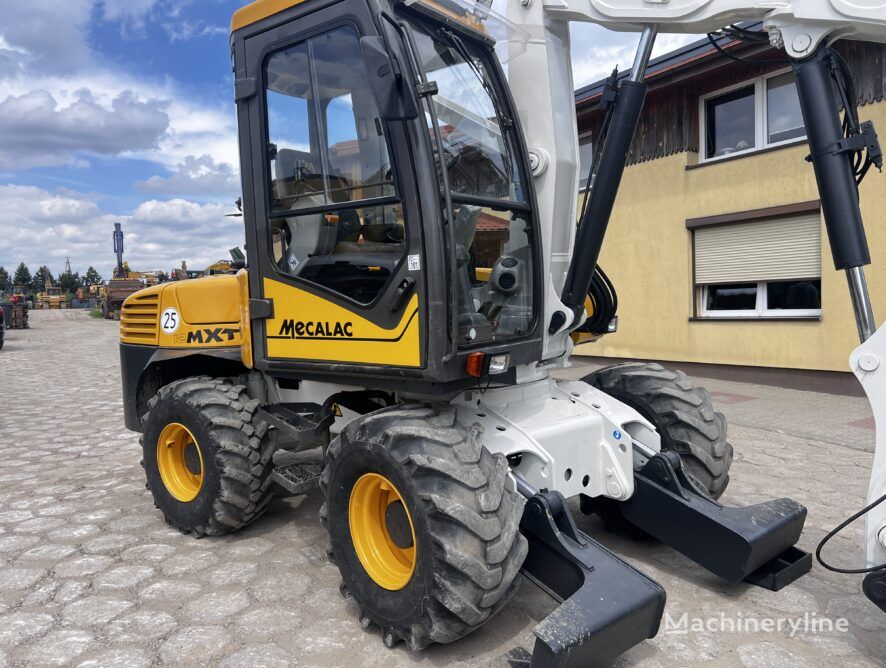 Mecalac 12MXT excavadora de ruedas