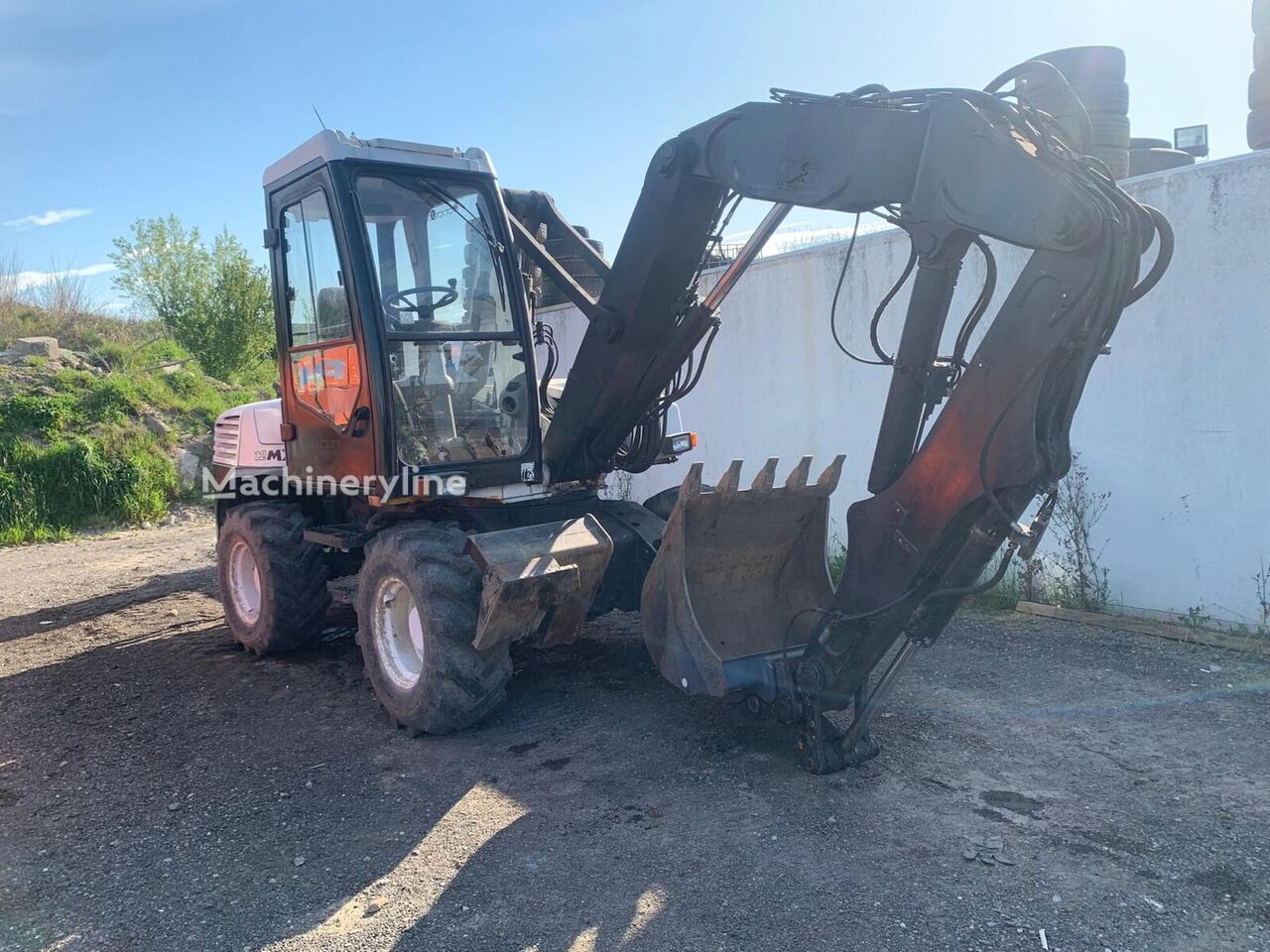 Pelle sur pneus Mecalac 12MXT - Machineryline