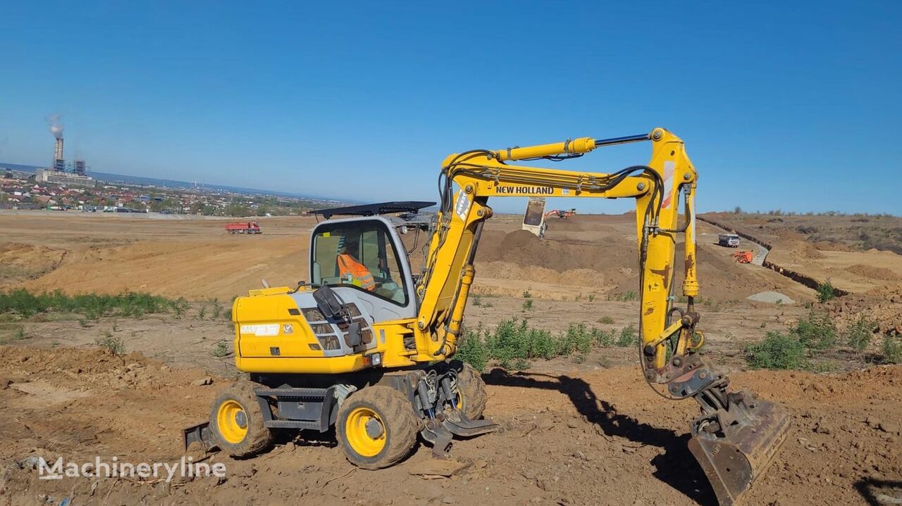 pelle sur pneus New Holland MH2.6