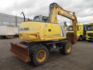 m&aacute;y đ&agrave;o b&aacute;nh lốp New Holland WE 150