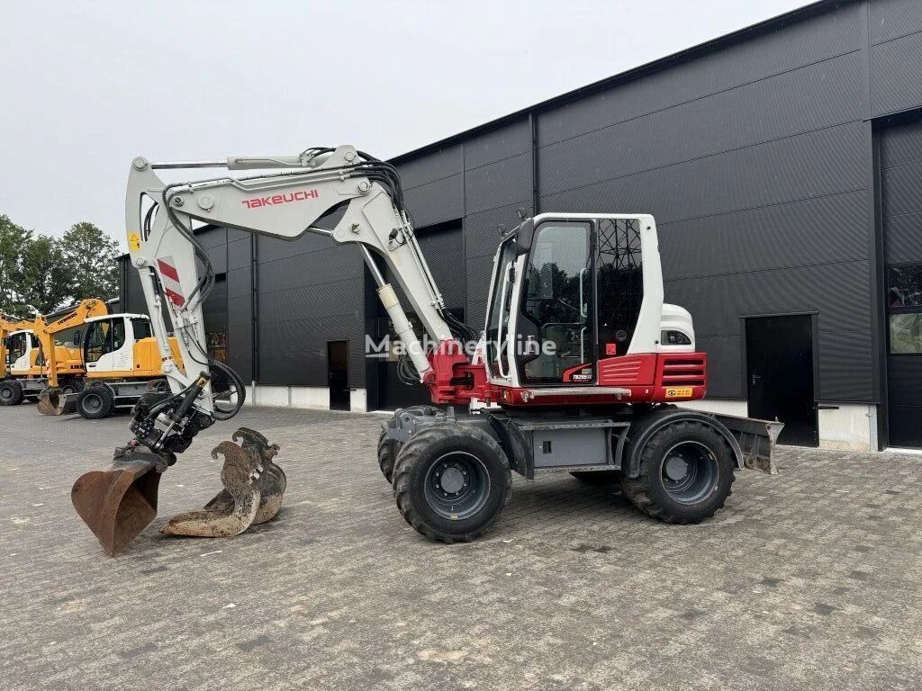 колесный экскаватор Takeuchi TB295W DKS 2015!