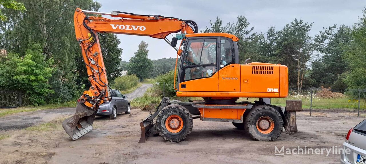 حفارة ذات العجلات Volvo EW 140 C Rototilt + 3 bucket