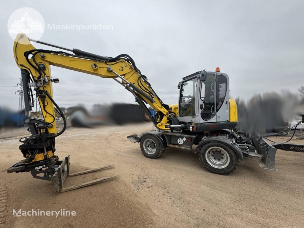 kolové rypadlo Wacker Neuson EW 100 med vagn